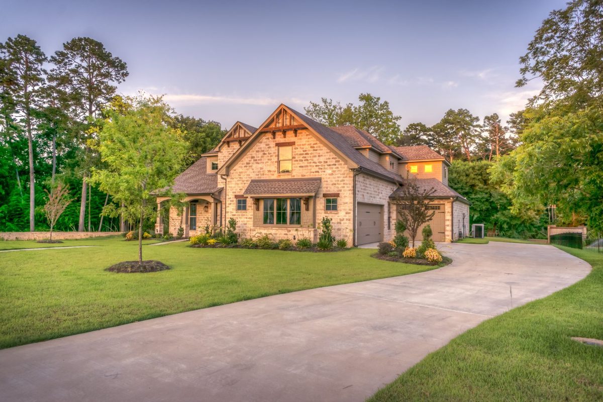 Bright San Antonio house with a front porch and a clear sky, shown as the outcome of a cleared title