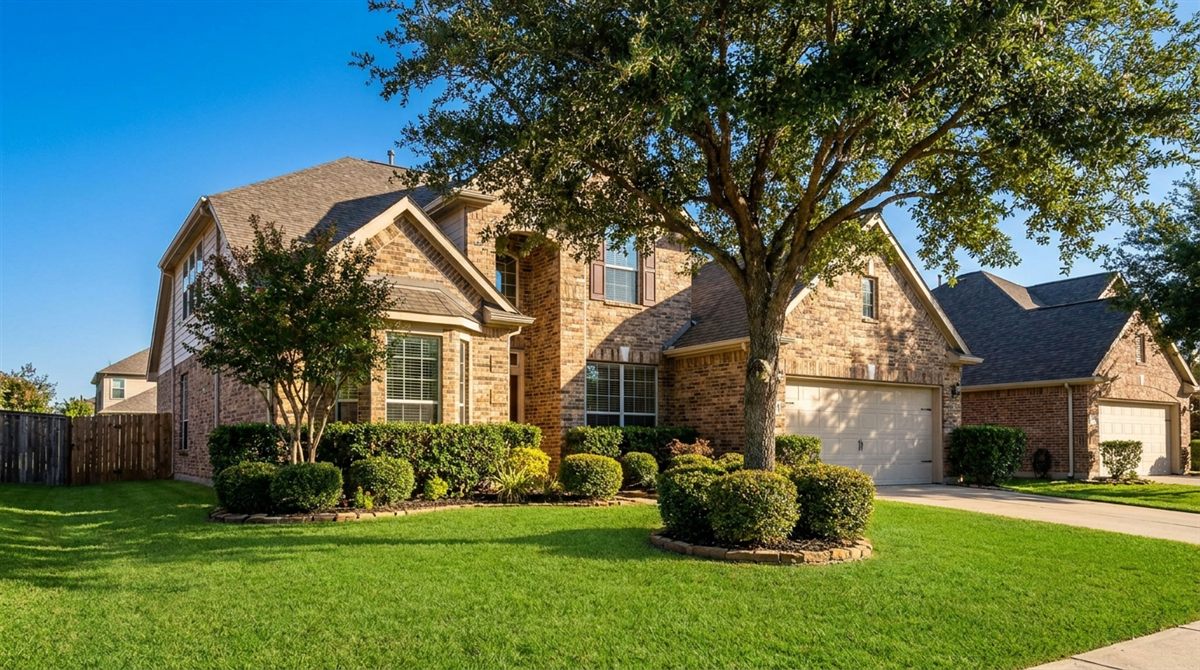 Bright, well-kept single-family brick home in a Texas suburb under a clear blue sky, the type of property cash-buyer franchises solicit across Dallas and Houston